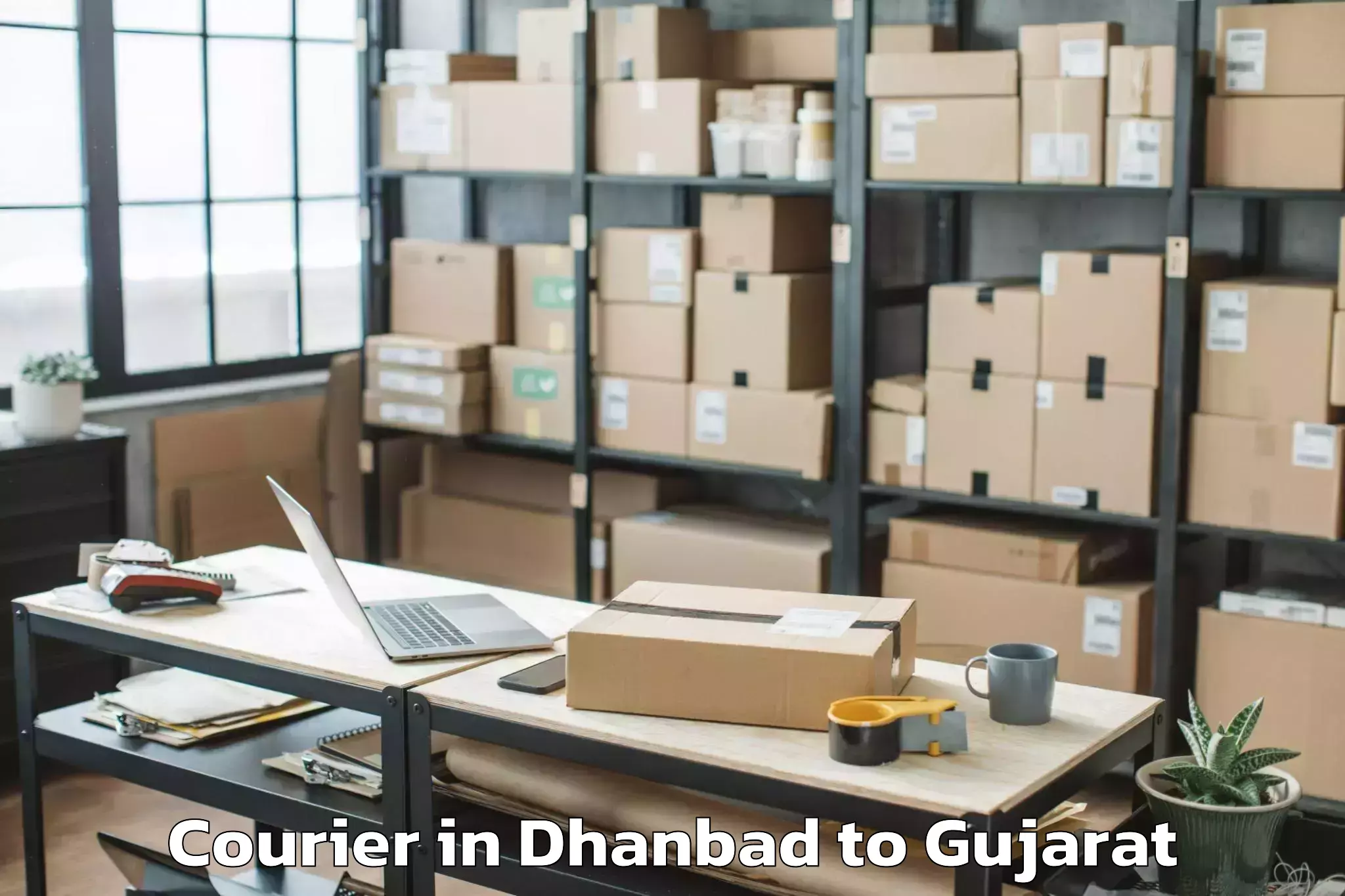 Easy Dhanbad to Porbandar Courier Booking